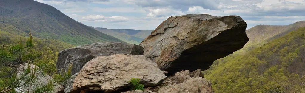 A rocky overlook on the Appalachian Trail above Glasgow, with a sweeping vista of the Blue Ridge.