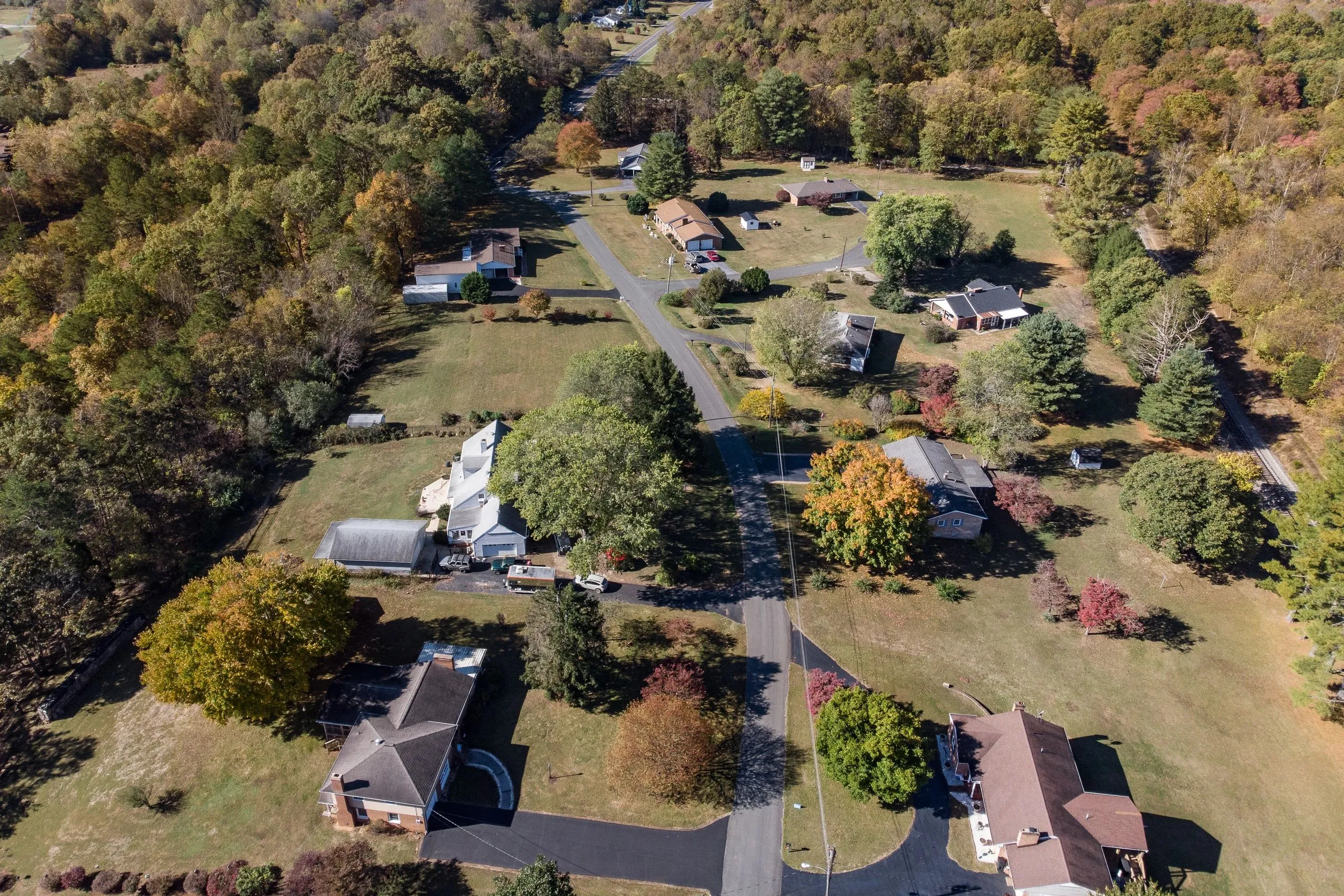 An aerial view of Glasgow residential streets in autumn, leaves turning across the neighborhoods.